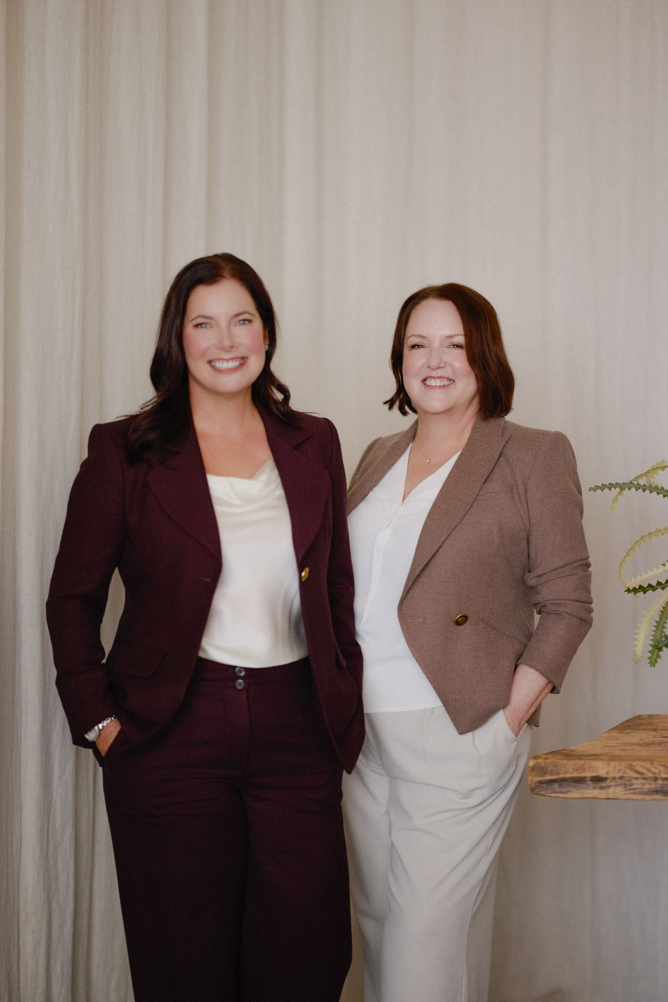 Jennifer and Amy, co-founders of AxisHer